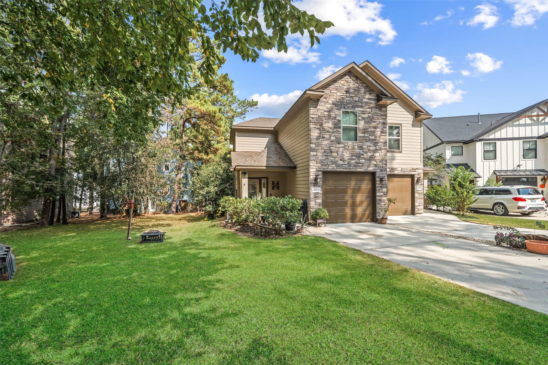Newer duplex located on a small culdesac within April Sound. Low maintenance with attractive stone and hardiplank siding, and fully landscaped