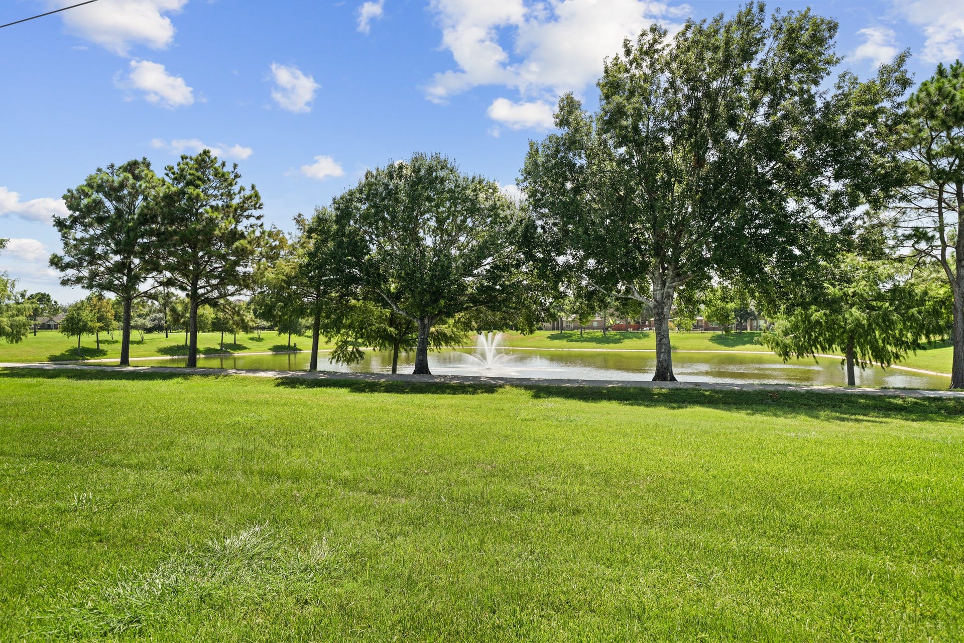 2634 Night Song Drive, Pearland, TX 77584 Enjoy serene water views year round from your own backyard.