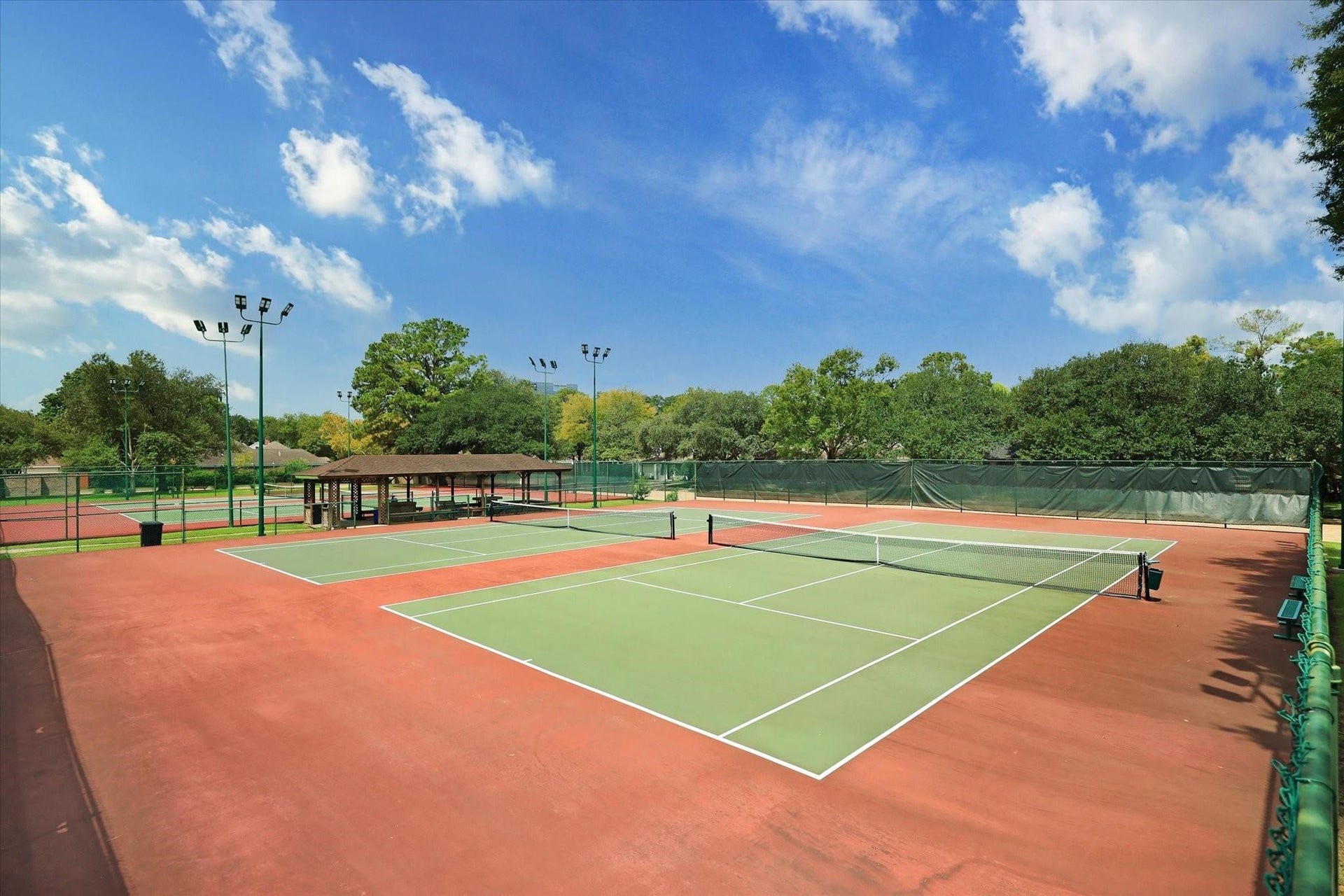 Three tennis courts and two Pickleball courts are available for residents to play from 6:00 am to 10:00 pm every day.