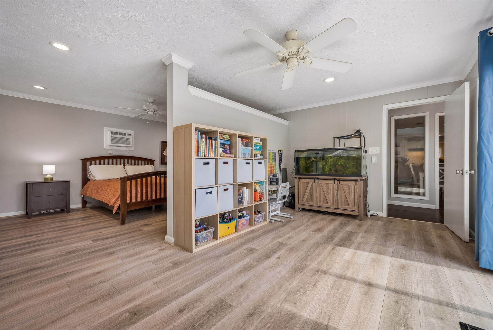 The expansive 4th bedroom doubles as a versatile flex space, adding 440 square feet of possibilities. Whether you envision a dedicated guest suite, a game room, or private home gym, this generous area adapts to your lifestyle and also features a convenient powder bath.