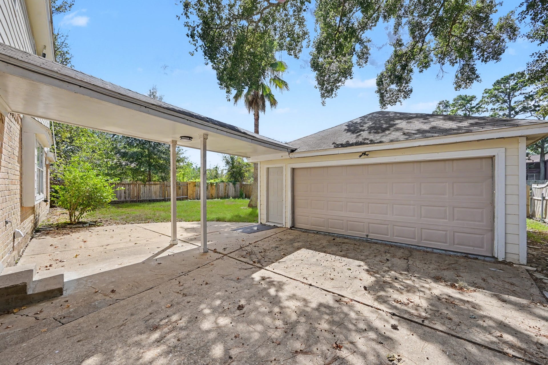 An oversized detached garage offers plenty of space for parking, projects, and enjoying a little fresh air!