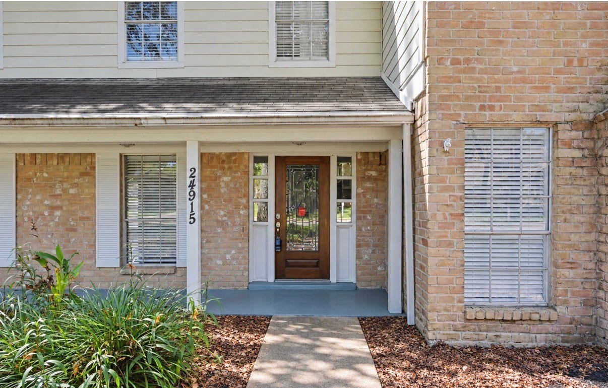 A welcoming covered front porch, the perfect place to greet guests and feel right at home.