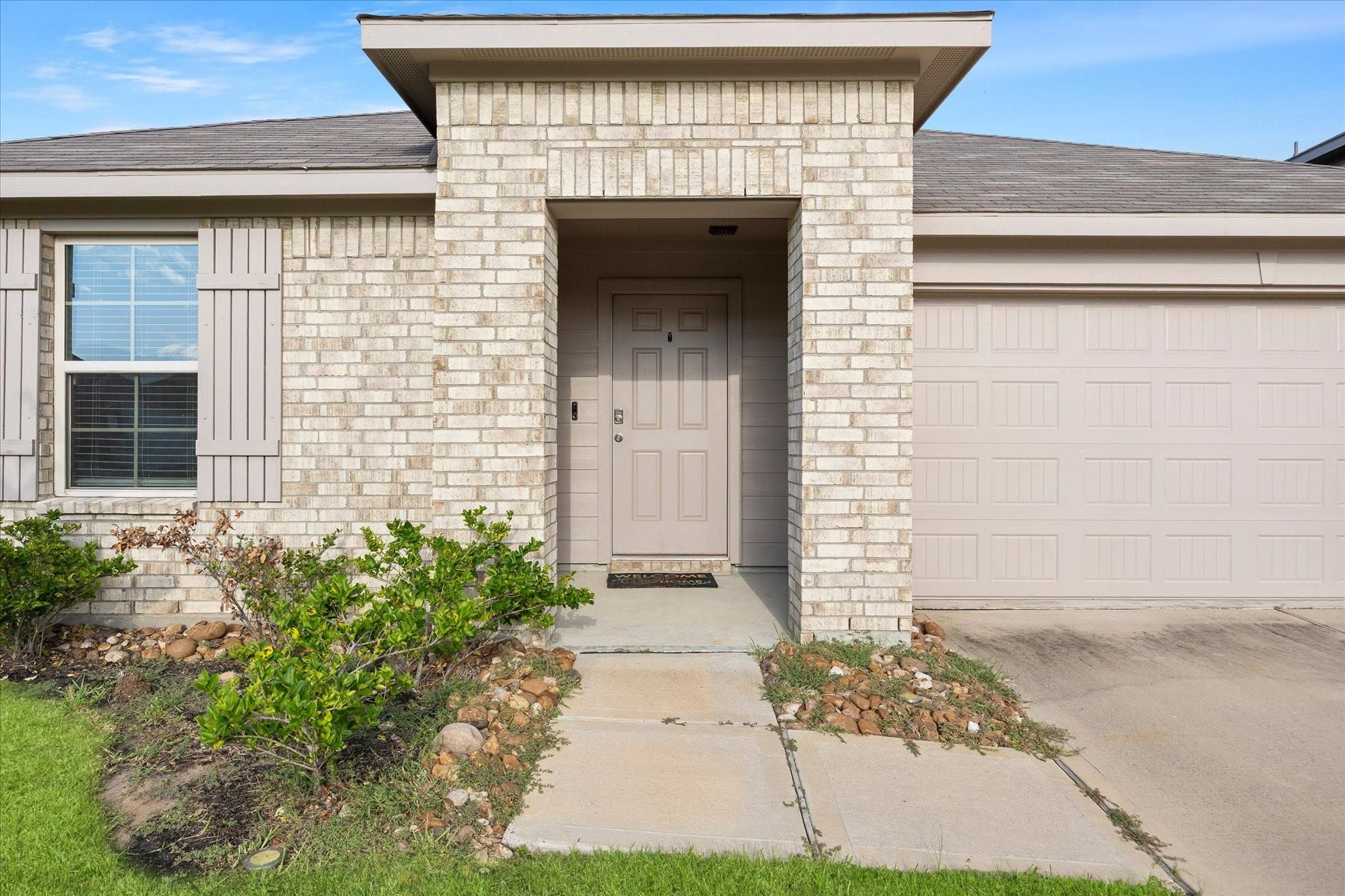 Covered front porch welcomes you home.