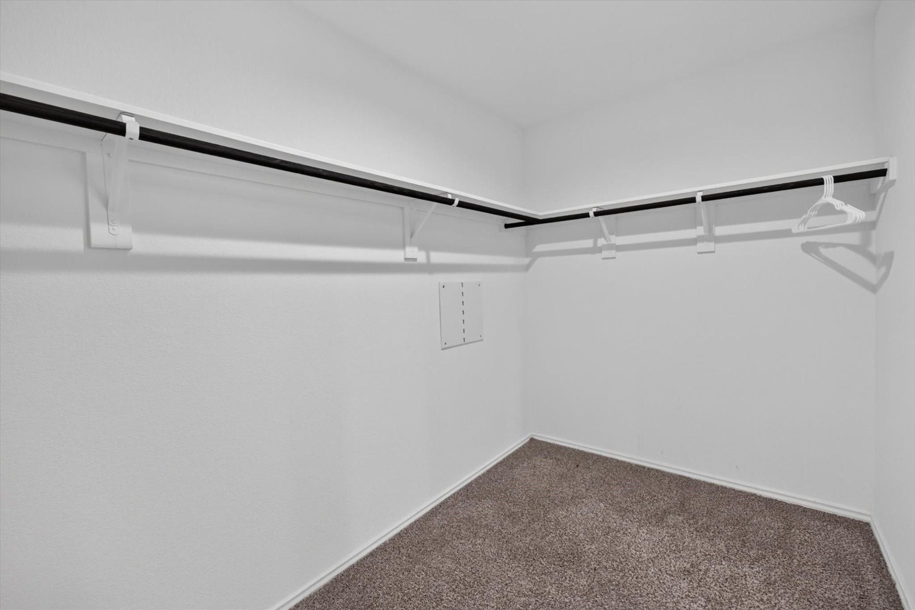 Oversized walk-in closet in the primary suite.