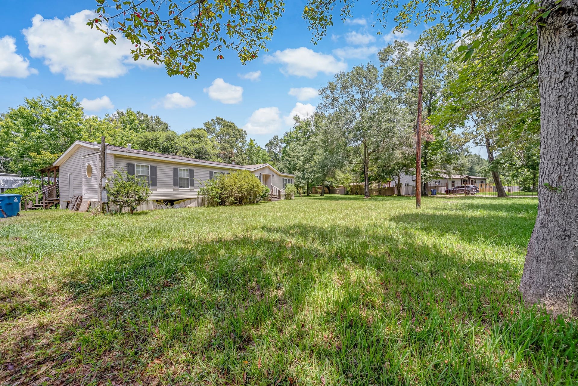 Framed by mature trees and expansive green space creating a peaceful setting with endless opportunities to personalize and make it your own.