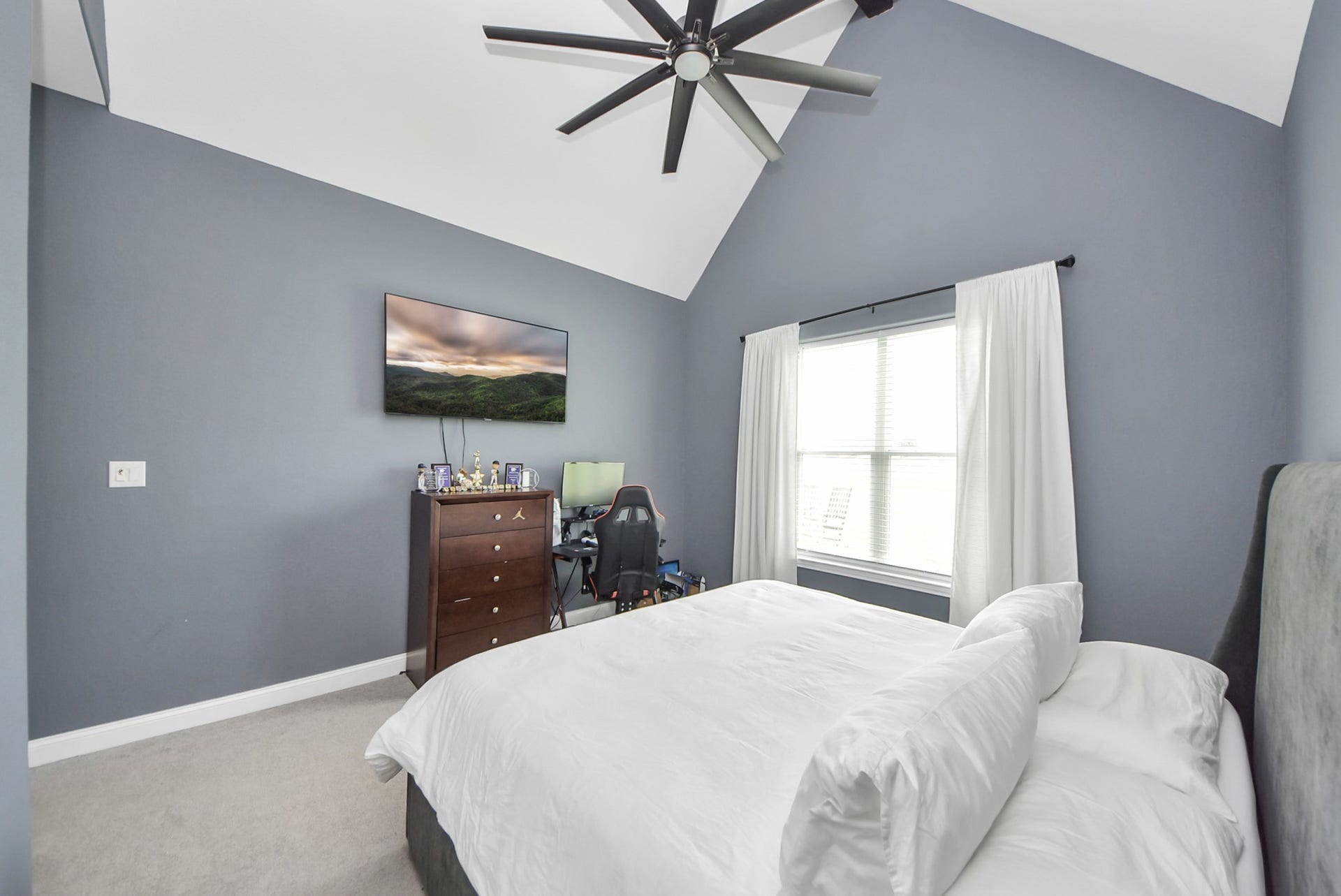 BEDROOM 2 W/ VAULTED CEILING
