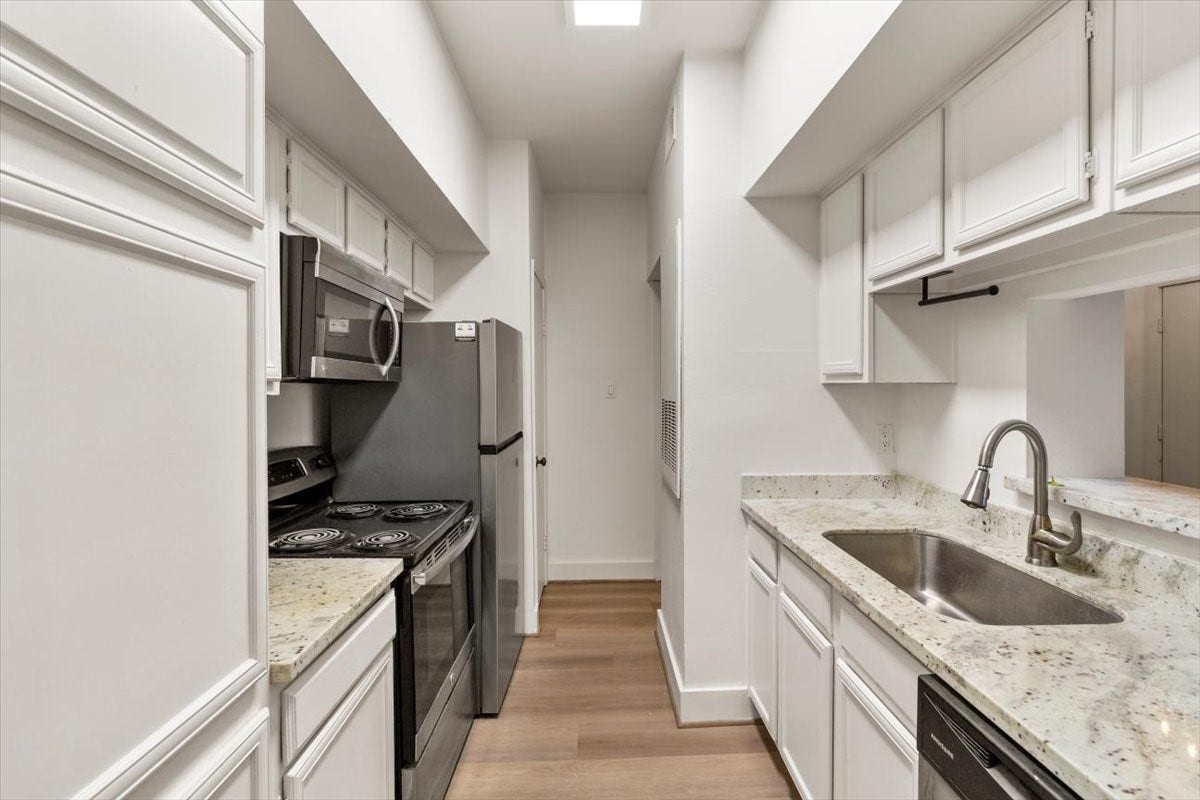 2025 Augusta Drive, #203, Houston, TX 77057 Kitchen With Granite Counters and Stainless Appliances