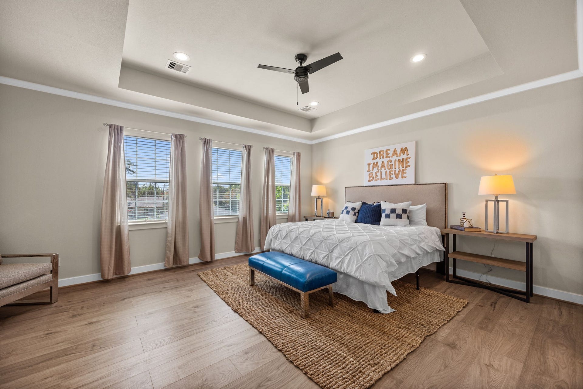 1606 Northwood Street, Houston, TX 77009 Welcome to the primary bedroom suite! Notice NO CARPET throughout the entire home. This large 15x19 FT room offers plenty of natural light, tray ceilings as well as crown molding.
