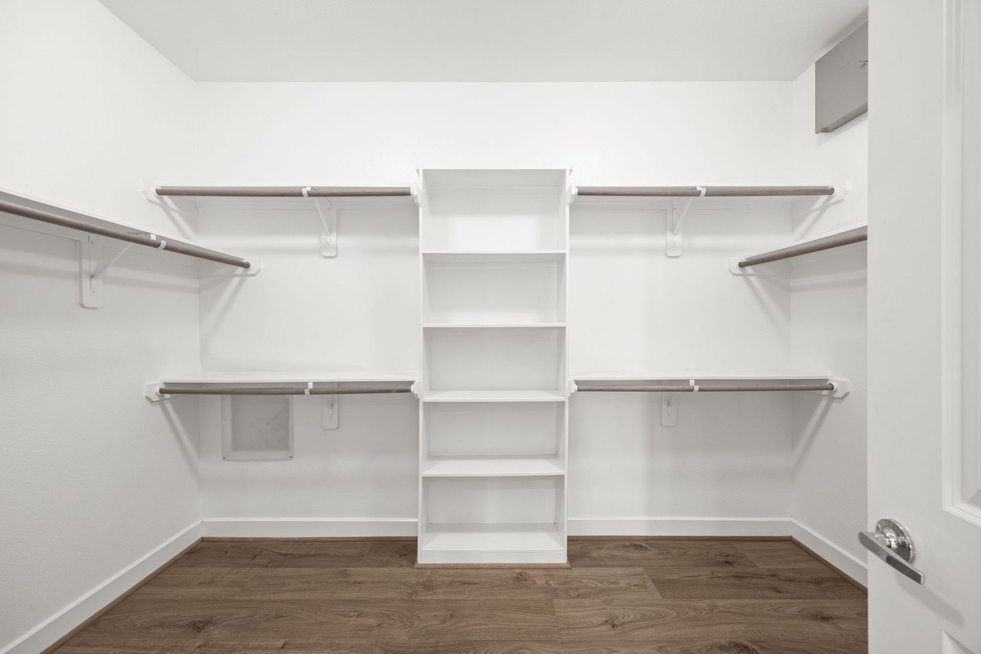 1606 Northwood Street, Houston, TX 77009 The primary walk-in closet has plenty of space for hanging, as well as built-in shelves. Enough space to add a central prep island in the future!