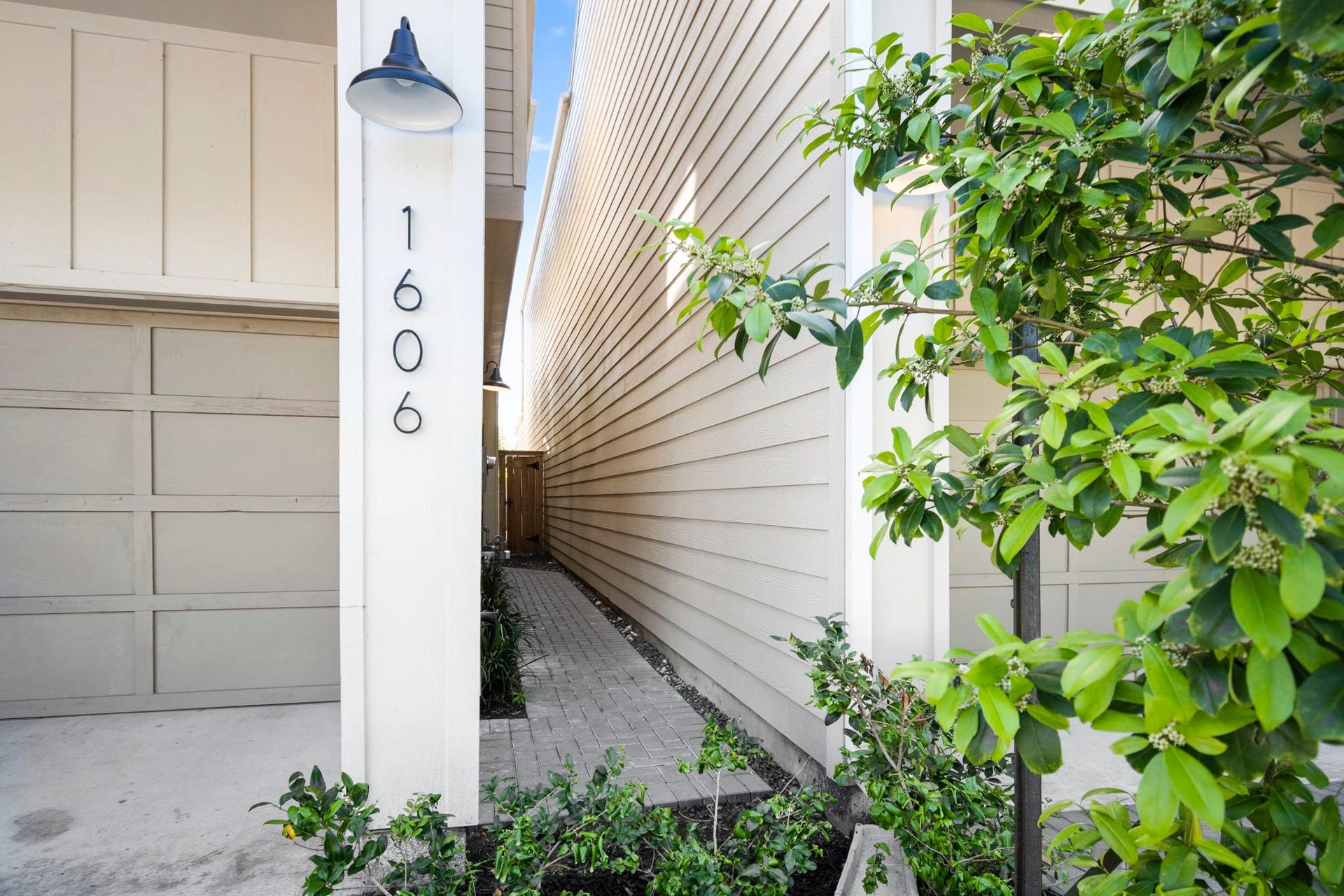 1606 Northwood Street, Houston, TX 77009 Pavered walkway to your front door which is also gated (gate open for the picture so not visible).