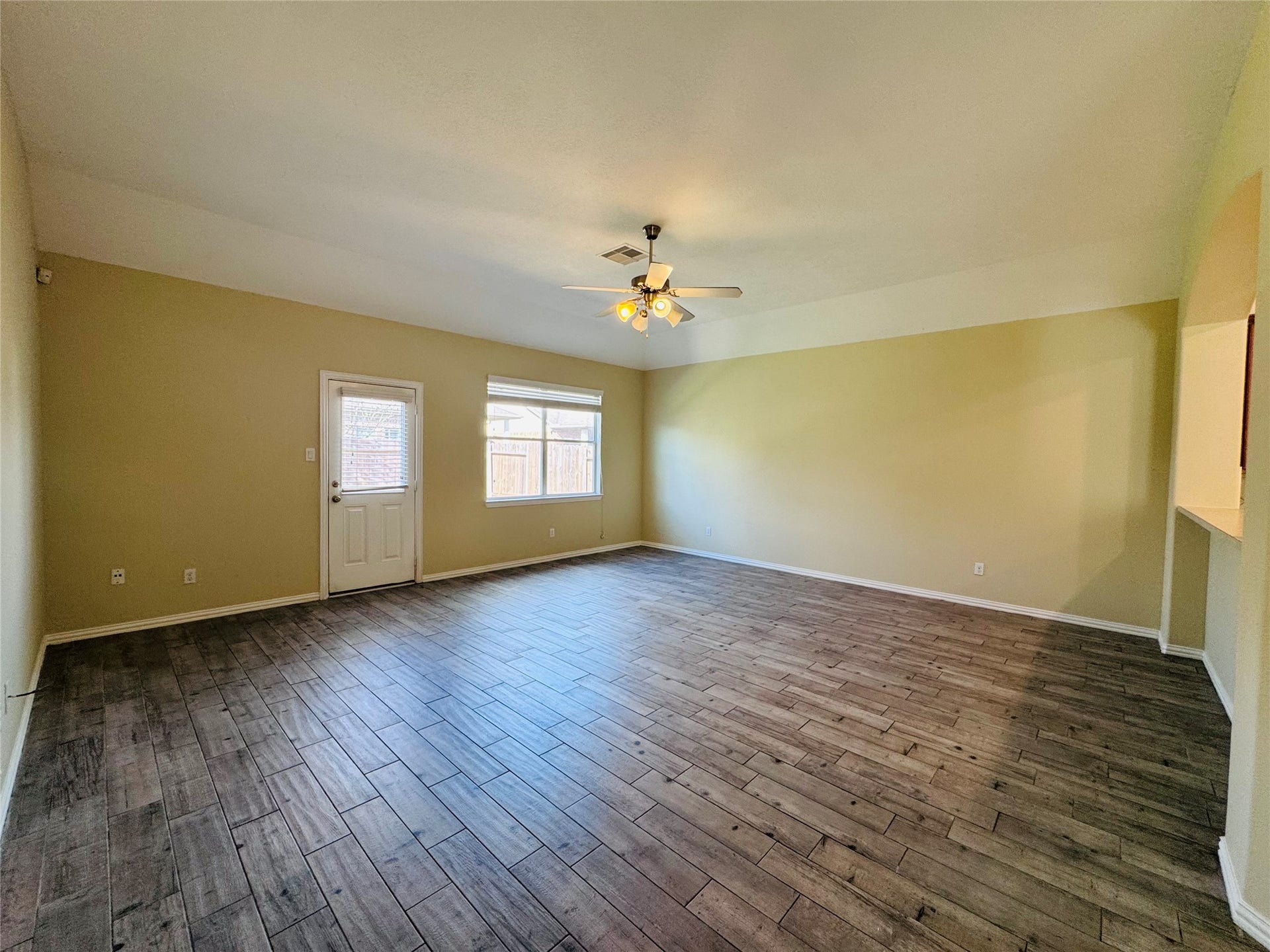 Spacious family area with natural light, and a cozy ambiance perfect for gatherings.