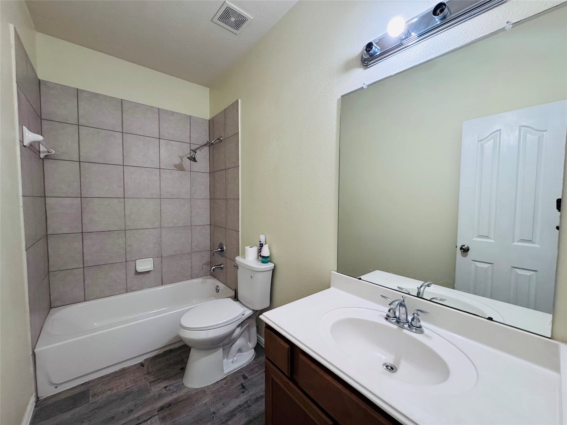 The second full bath offers a sleek combination of modern fixtures and a spacious layout, perfect for accommodating guests or family with ease.