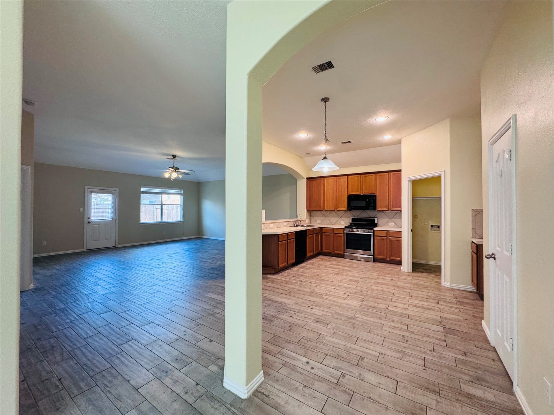 Spacious open-concept family area & kitchen.