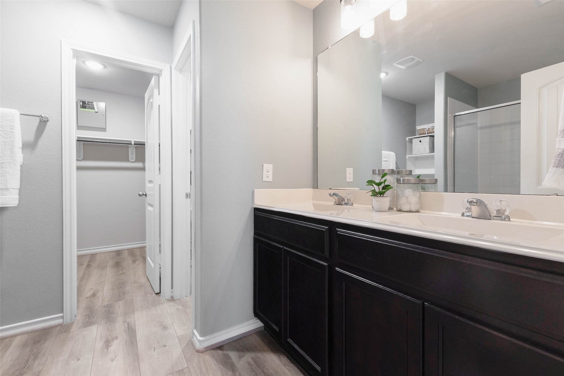 29130 Jarvis Bay Pass, Katy, TX 77494 The primary bathroom features double sinks and an oversized walk-in shower.