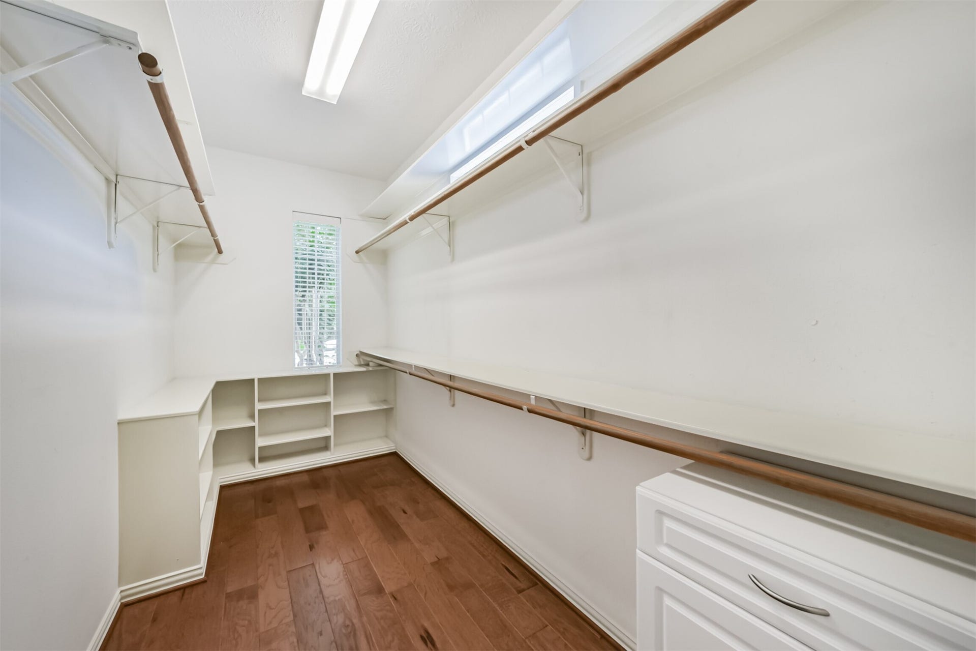 12614 Brazos Bend Trail, Humble, TX 77346 Huge Primary closet with a few built in upgrades and natural light.