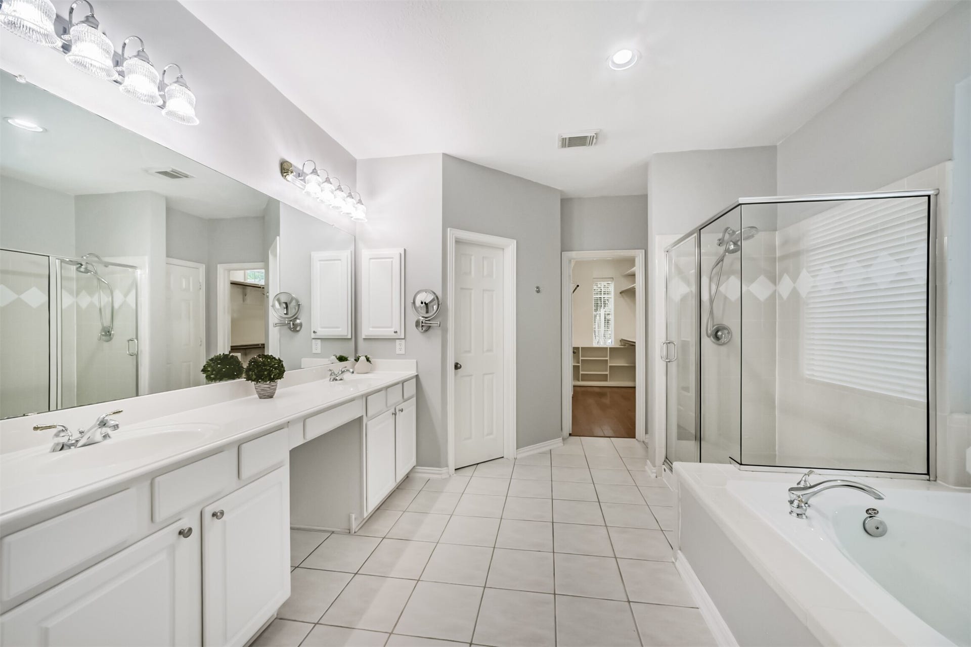 12614 Brazos Bend Trail, Humble, TX 77346 Primary bath with double sinks, vanity, separate shower and bath