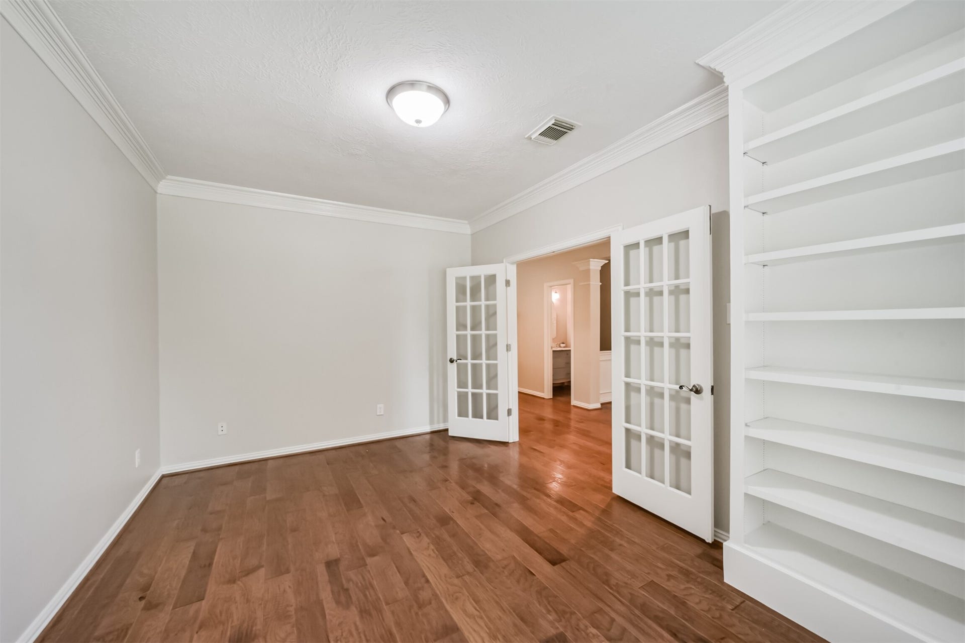 12614 Brazos Bend Trail, Humble, TX 77346 Study has built-ins and same Flooring throughout house