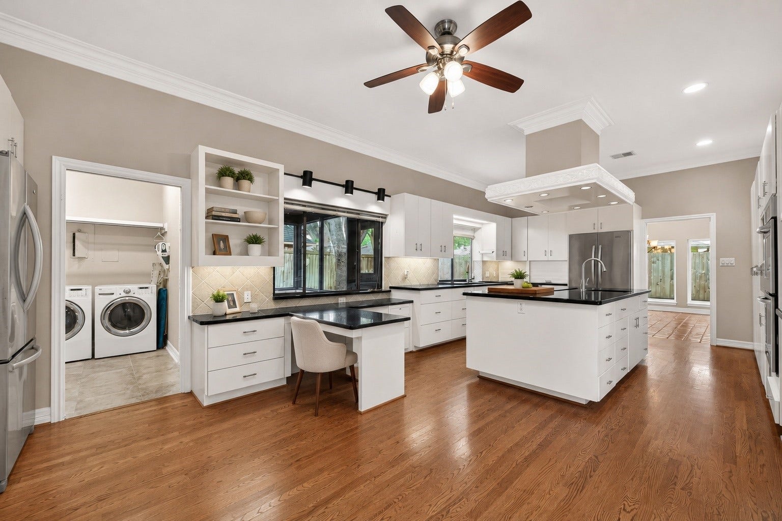 Large Chefs Kitchen with premium wood floors