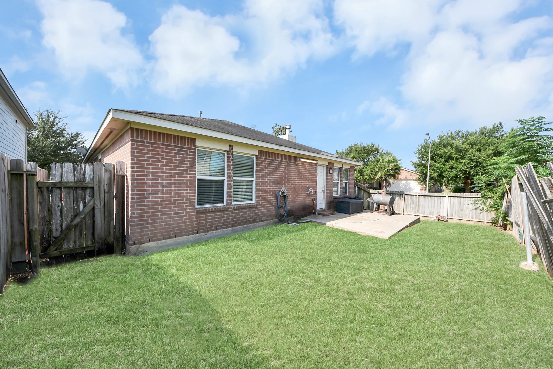 17918 Carroll Place Lane, Richmond, TX 77407 Back of home- New fence recently added