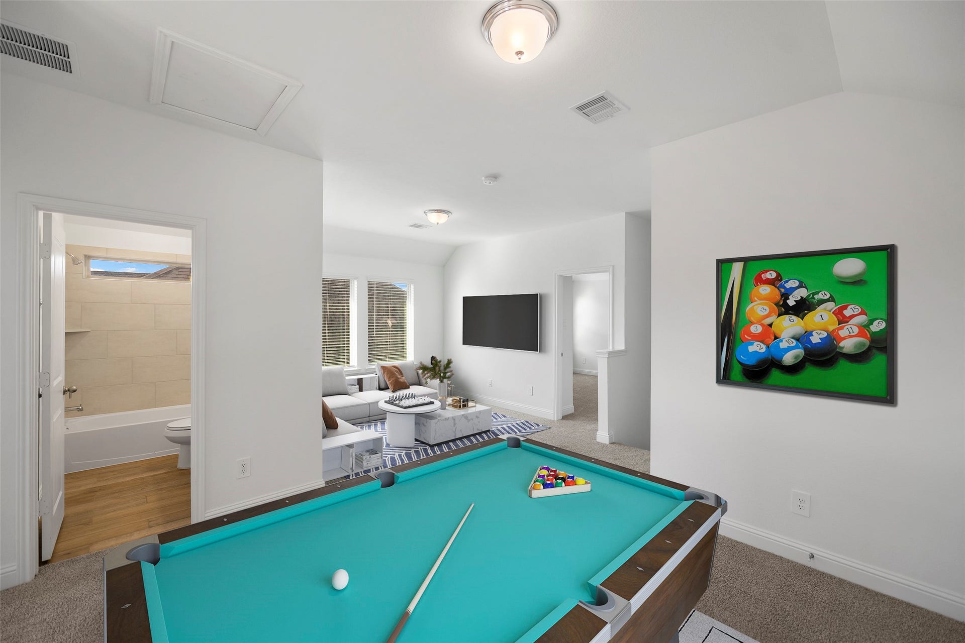 15722 Rosemary Hill Lane, Conroe, TX 77302 This room is virtually staged to show just one of many options the game room/loft areas can be utilitized.