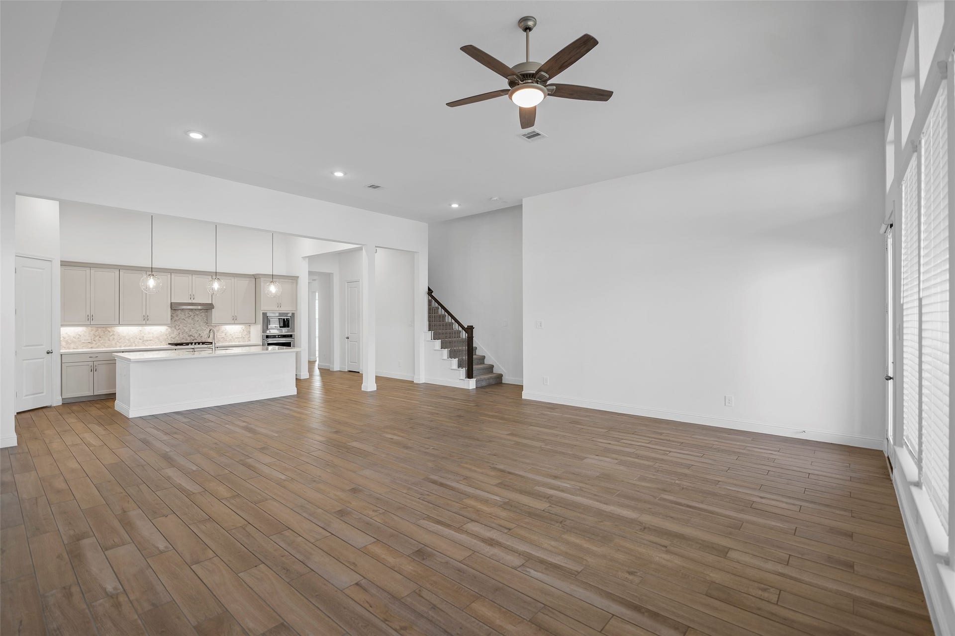 15722 Rosemary Hill Lane, Conroe, TX 77302 A view of the Family Room, Dining and Kitchen