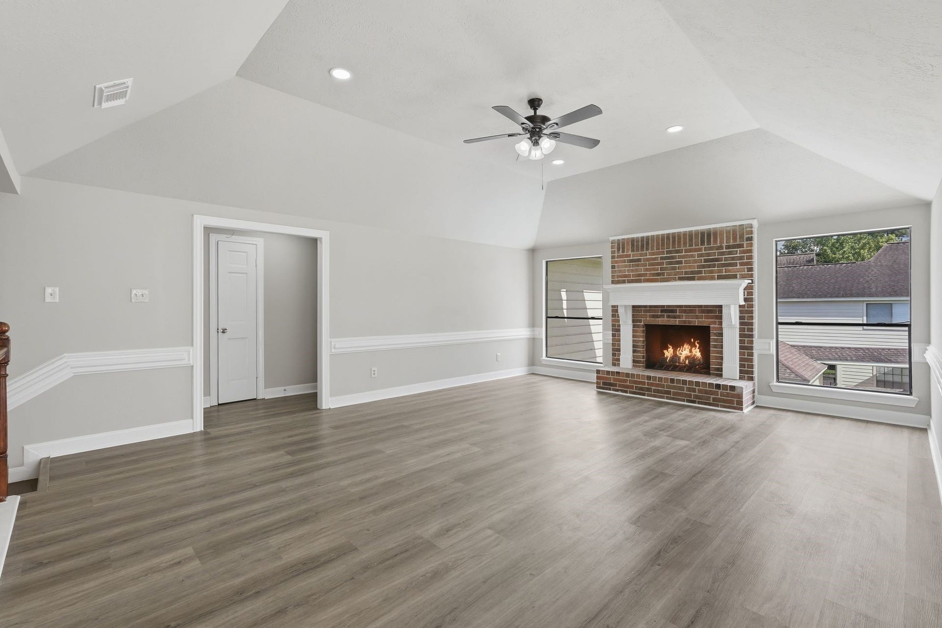 Living Room Upstairs! There are two other bedrooms tucked down that hallway!