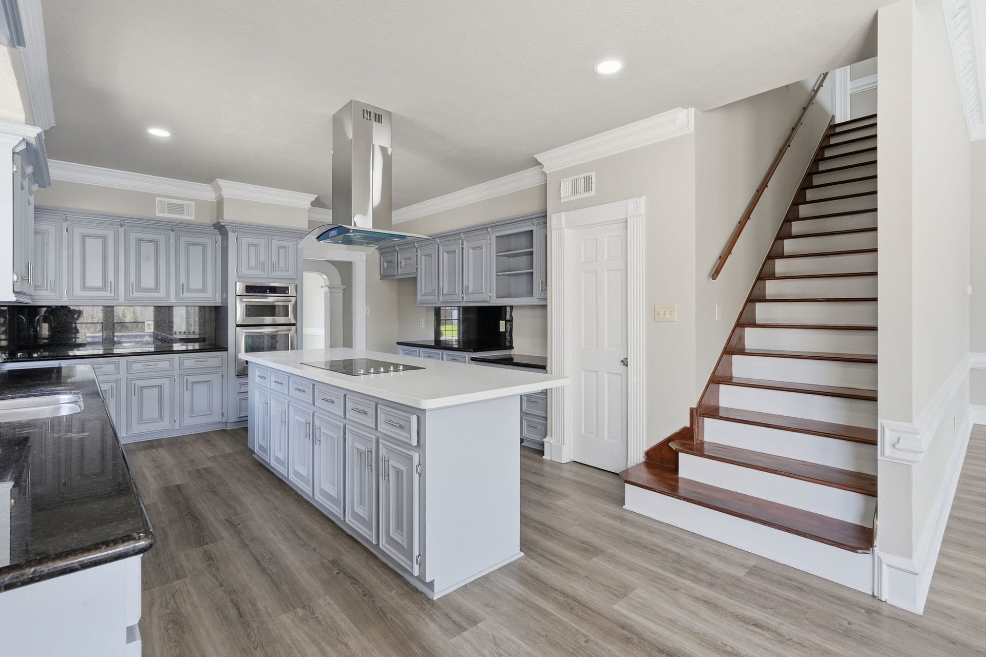 The second staircase offers convenience for everyone upstairs!