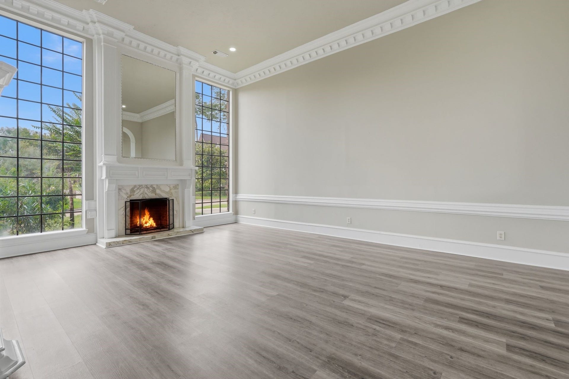 Grand Parlour with a show stopping fireplace!