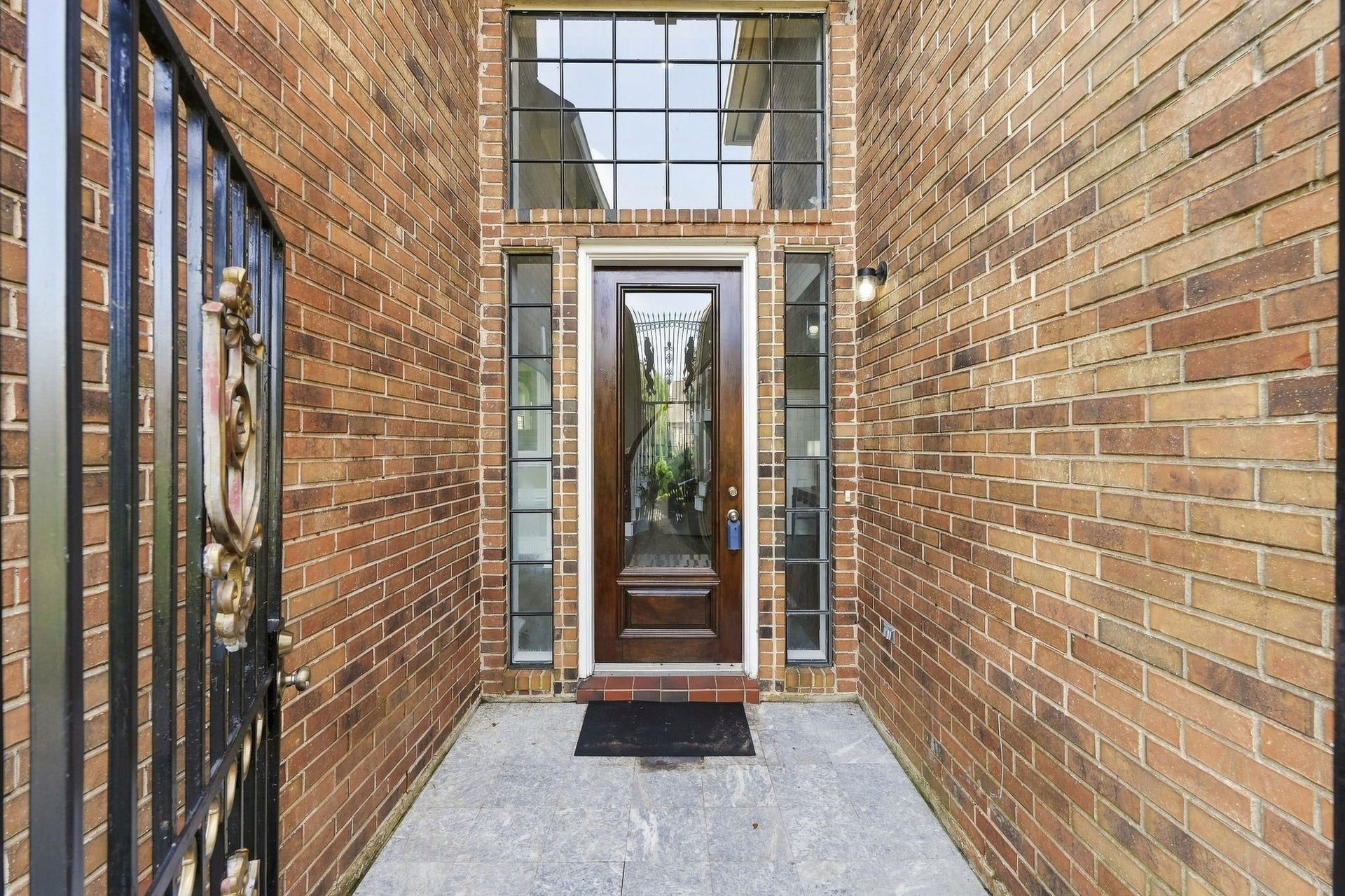 A front porch courtyard gives added privacy and peace of mind for all of your deliveries!