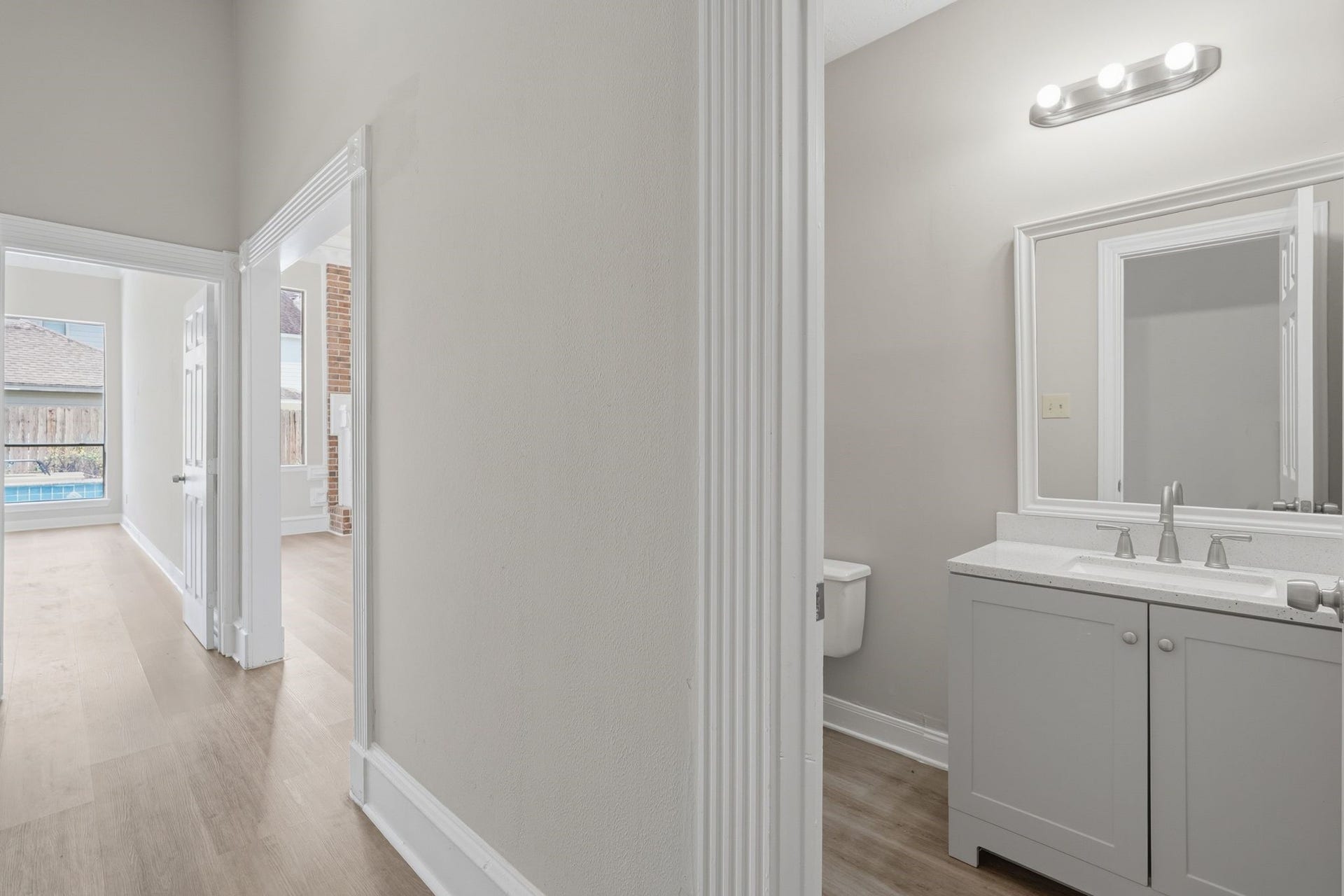 Convenient Half bath between the living room and the foyer!