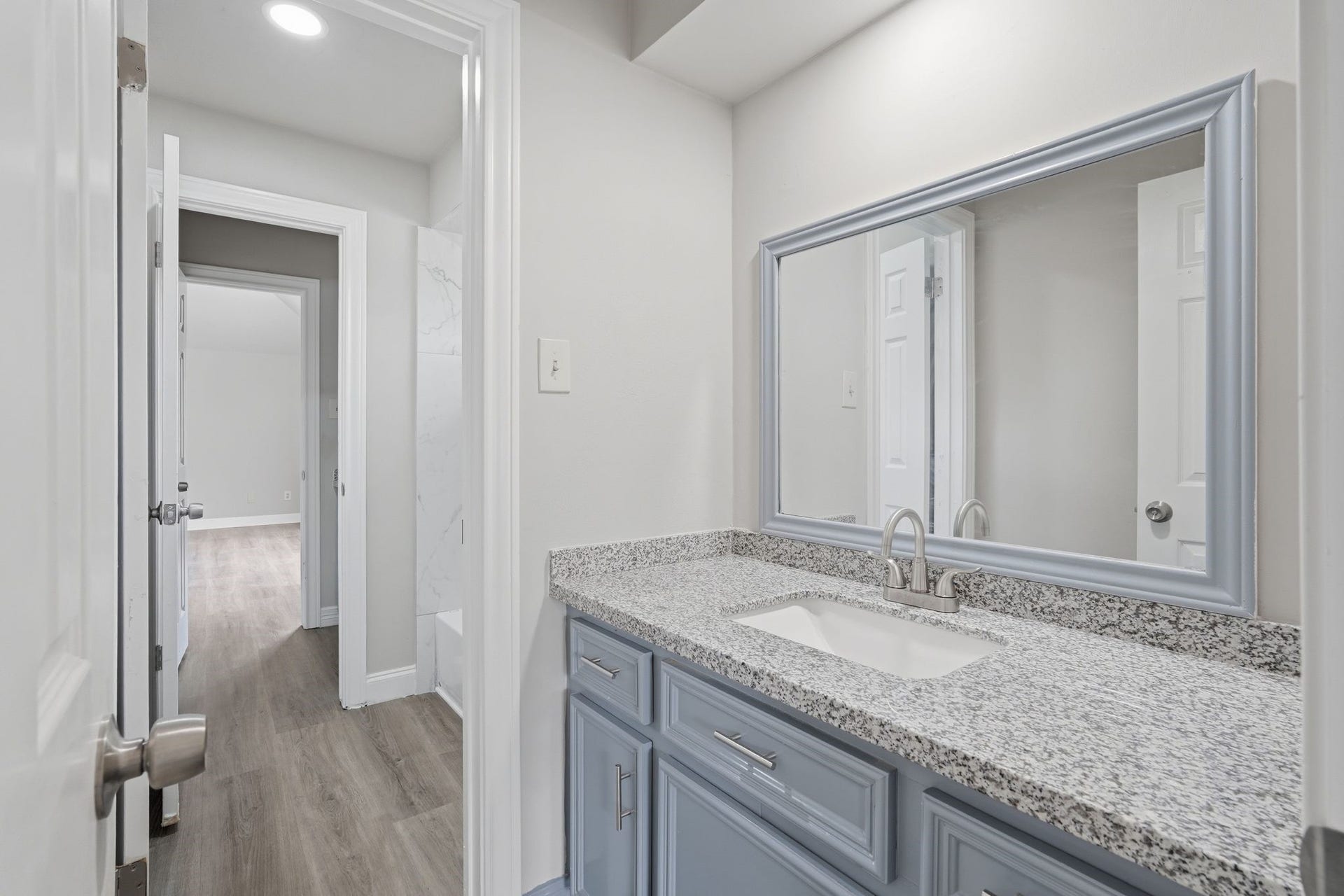 Jack & Jill Bathroom connecting bedroom 4 & 5, each with a Private Vanity!