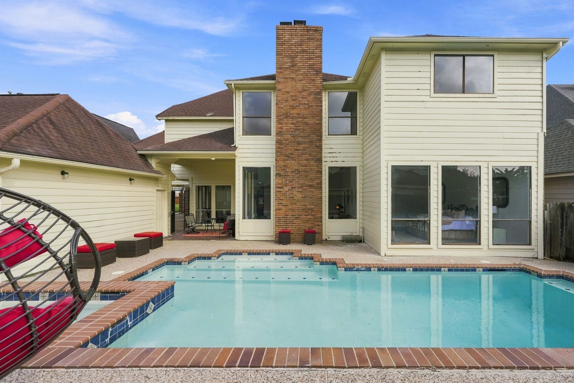 Your Primary Suite and the Living room Overlook the pool!