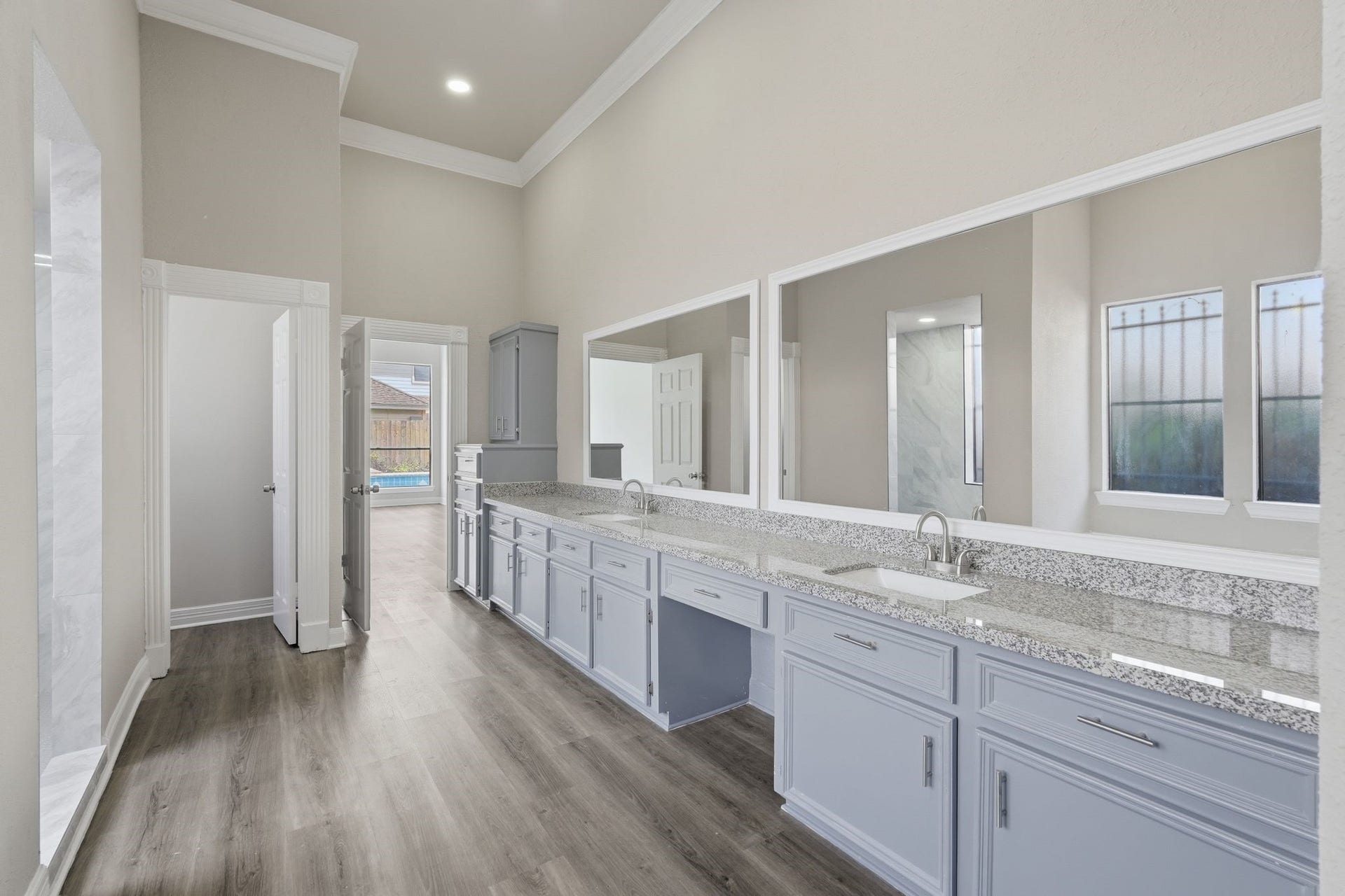 Spa-like Primary Bathroom. Dual Sinks, vanity, and great storage space!