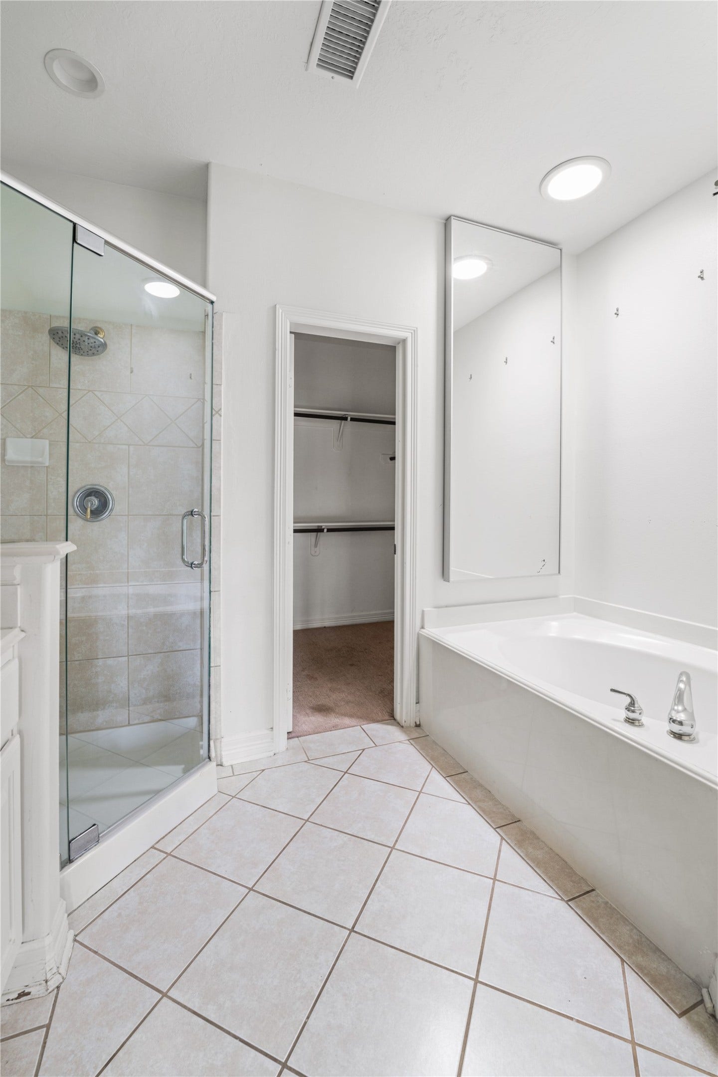 1739 French Village Drive, Houston, TX 77055 Standing shower and soaking tub in your primary bathroom.