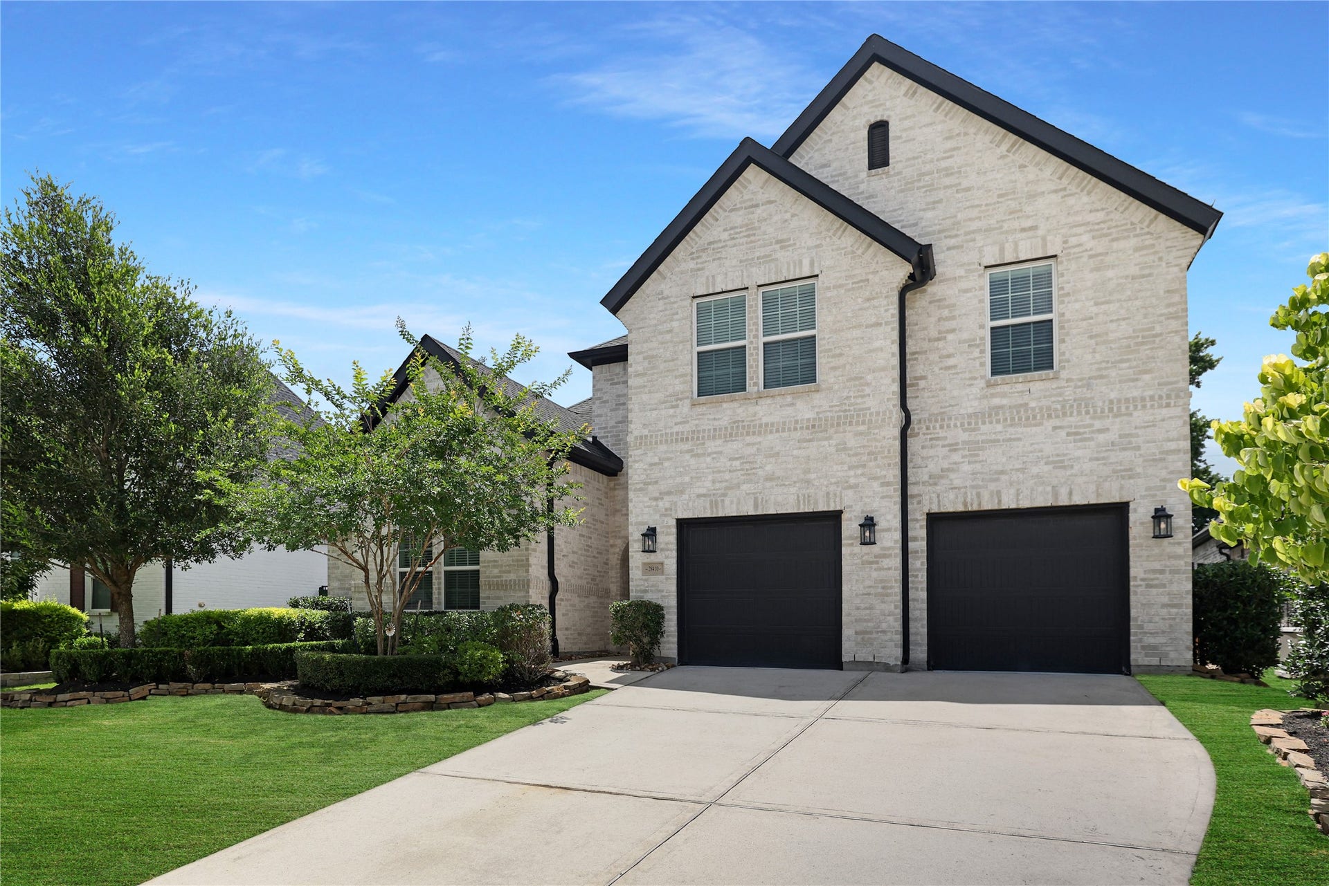 Home features a 3 car tandem garage inside.