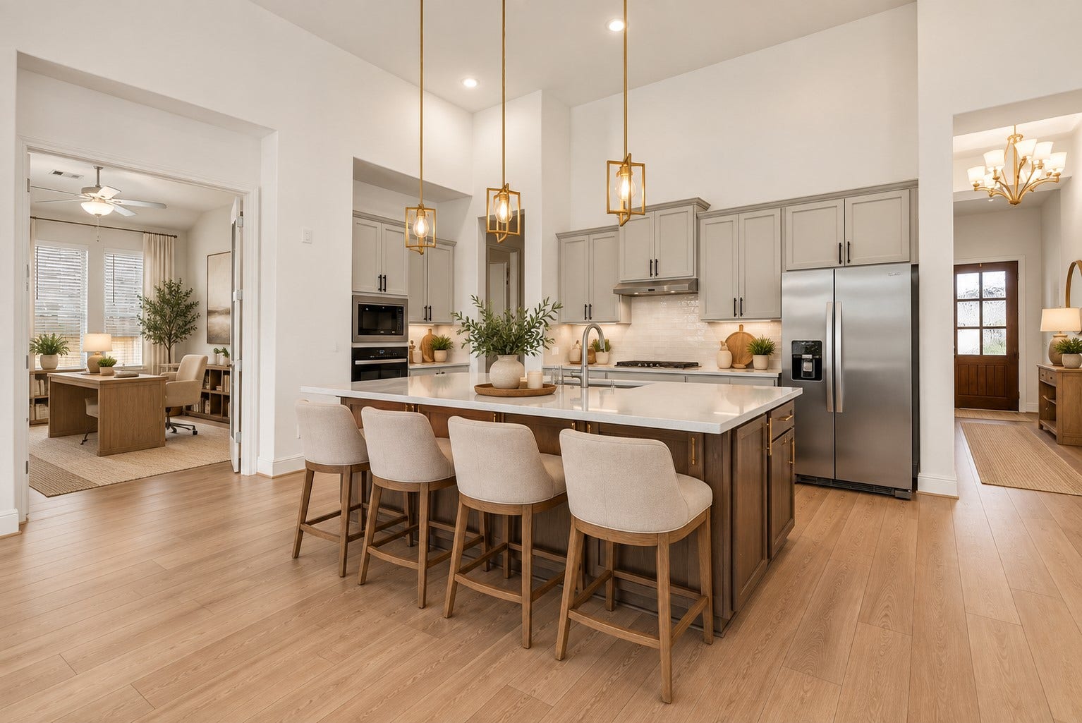 4816 Blue Pearl Lane, League City, TX 77573 The beautifully appointed kitchen opens seamlessly to the living room and features an oversized island, stainless steel appliances, and 42-inch cabinetry with crown molding.