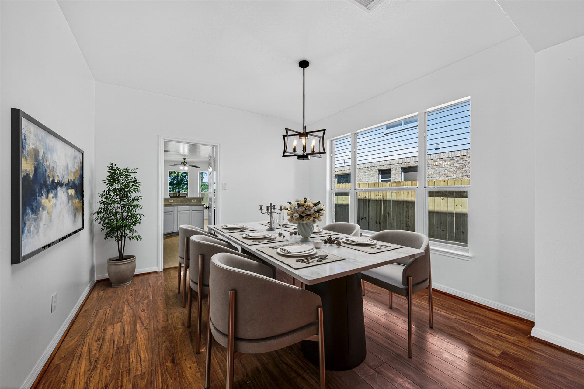 13910 Sunset View Drive, Houston, TX 77083 The formal dining area is a bright and inviting space, highlighted by a large window that frames views of the private backyard.