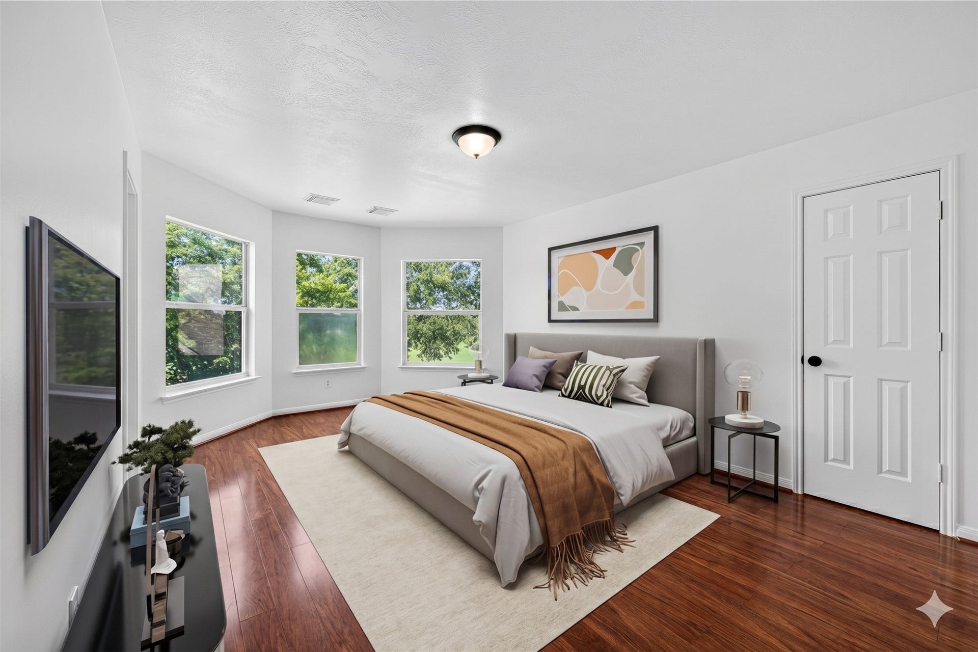 13910 Sunset View Drive, Houston, TX 77083 The second bedroom is notably cheerful, filled with large windows that radiate positive vibes and plenty of natural light