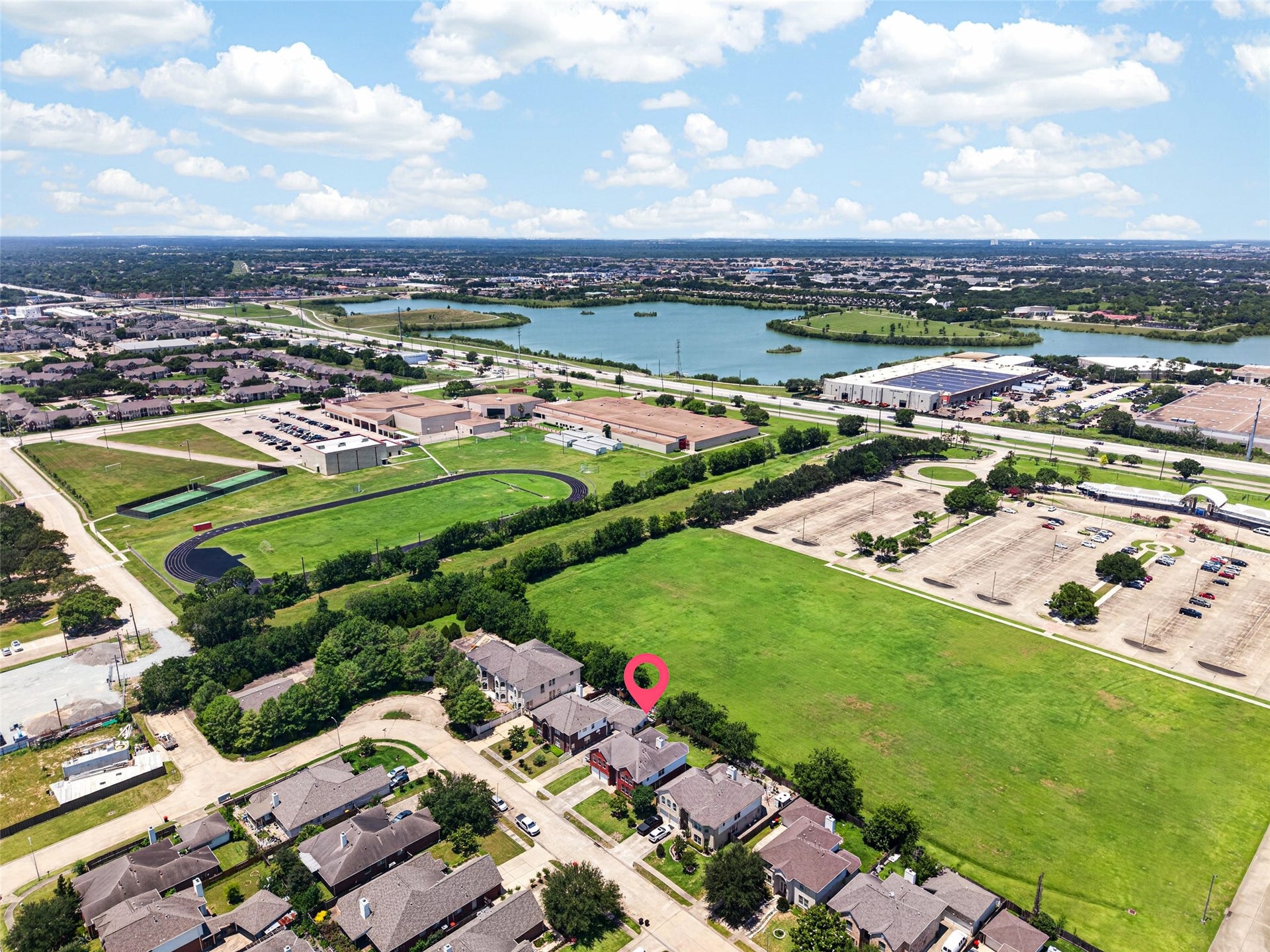 13910 Sunset View Drive, Houston, TX 77083 Beyond the nearby community lake, the property offers easy access to major highways, ensuring a lifestyle of both convenience and recreation for the whole family.