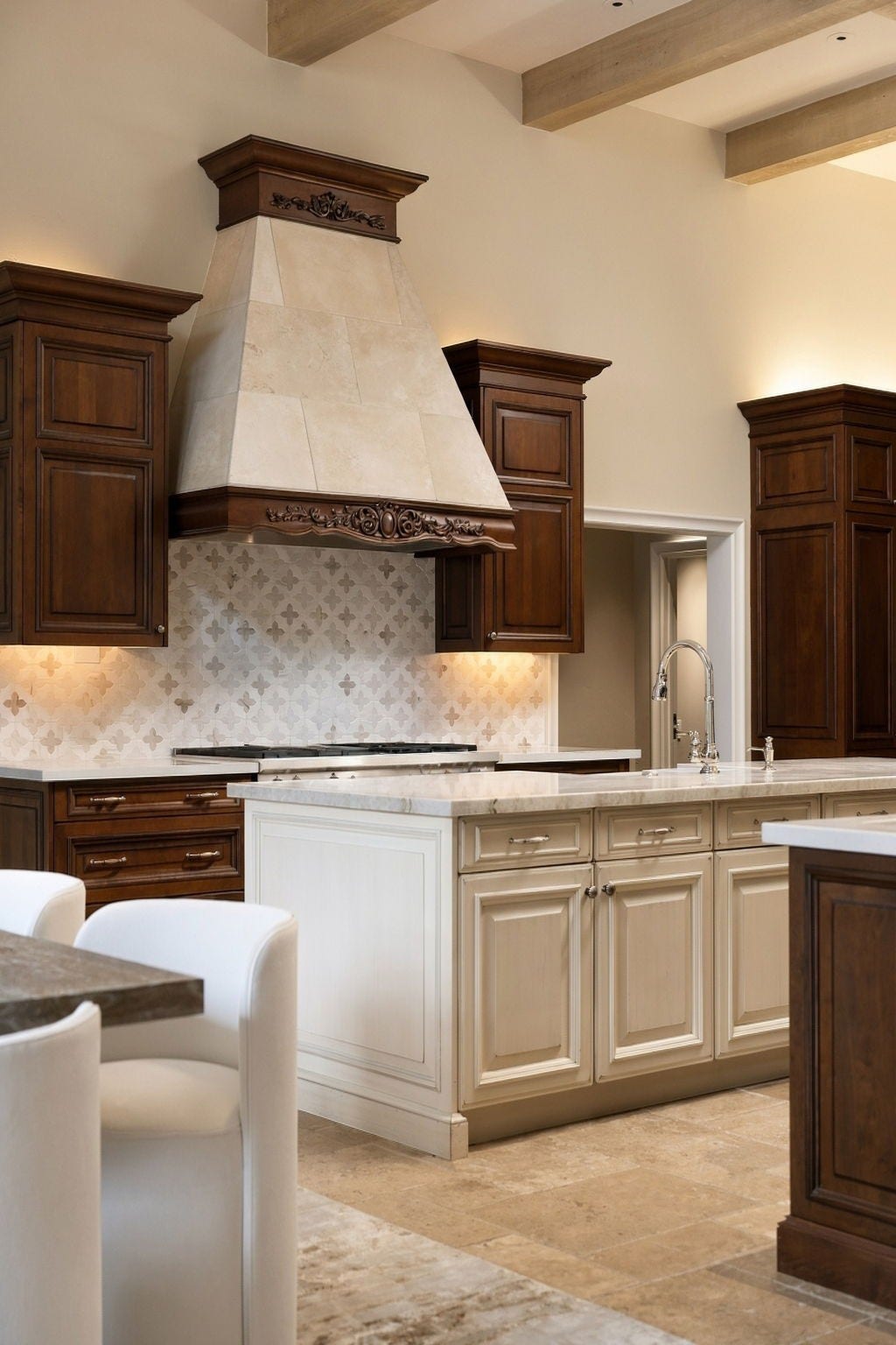 1 Gage Court, Houston, TX 77024 The custom travertine vent hood reads more like a carved architectural feature than a conventional kitchen element. Its special-order stone was sourced from the same Italian quarry Michelangelo used for some of his work, bringing an unexpected art-historical connection into the heart of the home.