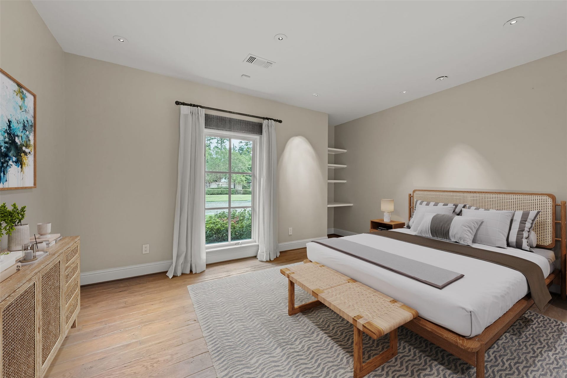 1 Gage Court, Houston, TX 77024 This secondary bedroom features hand-scraped French white oak flooring, generous proportions and a large window overlooking the landscaped grounds. A walk-in closet and built-in wardrobe storage add everyday function. (digitally staged)
