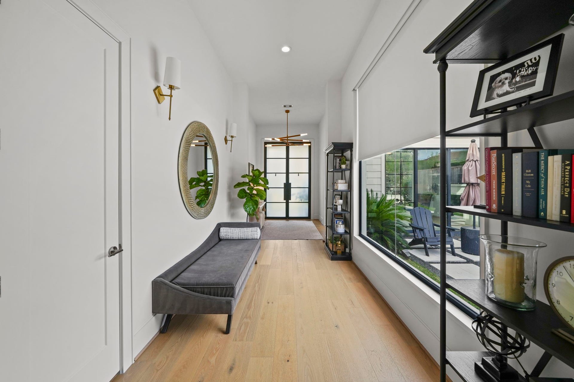 6425 Remlap Street, Houston, TX 77055 The entry is stunning with a wall of windows over looking the pool and outdoor space!