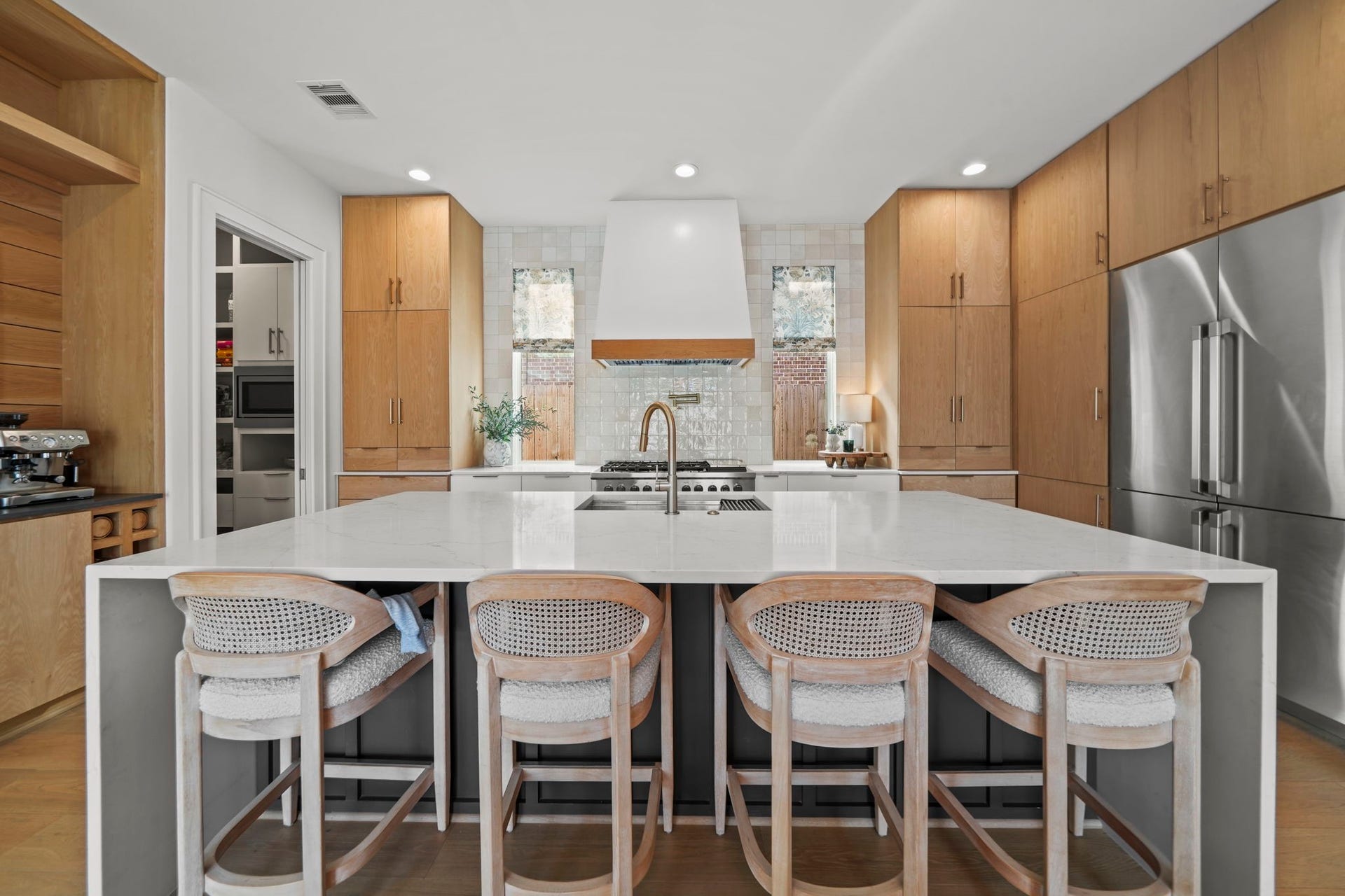 6425 Remlap Street, Houston, TX 77055 The kitchen is stunning! Quartz countertops, built in refrigerator/freezer, pot filler and more!