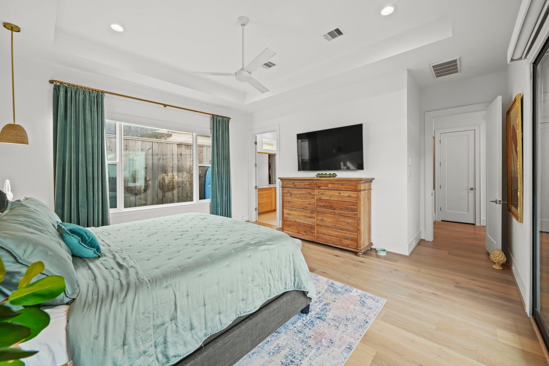 6425 Remlap Street, Houston, TX 77055 The primary is tucked away in the home providing a great space to unwind.