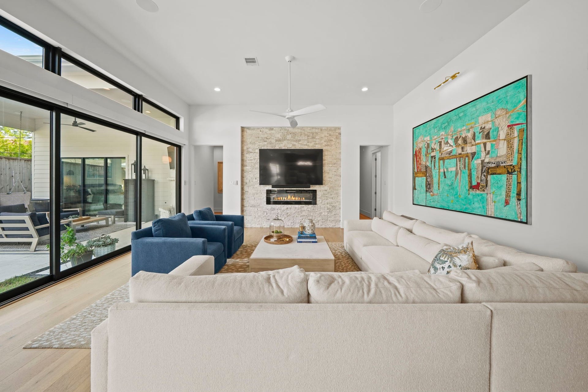 6425 Remlap Street, Houston, TX 77055 One of two living spaces in the home and opens up for indoor/outdoor entertaining!