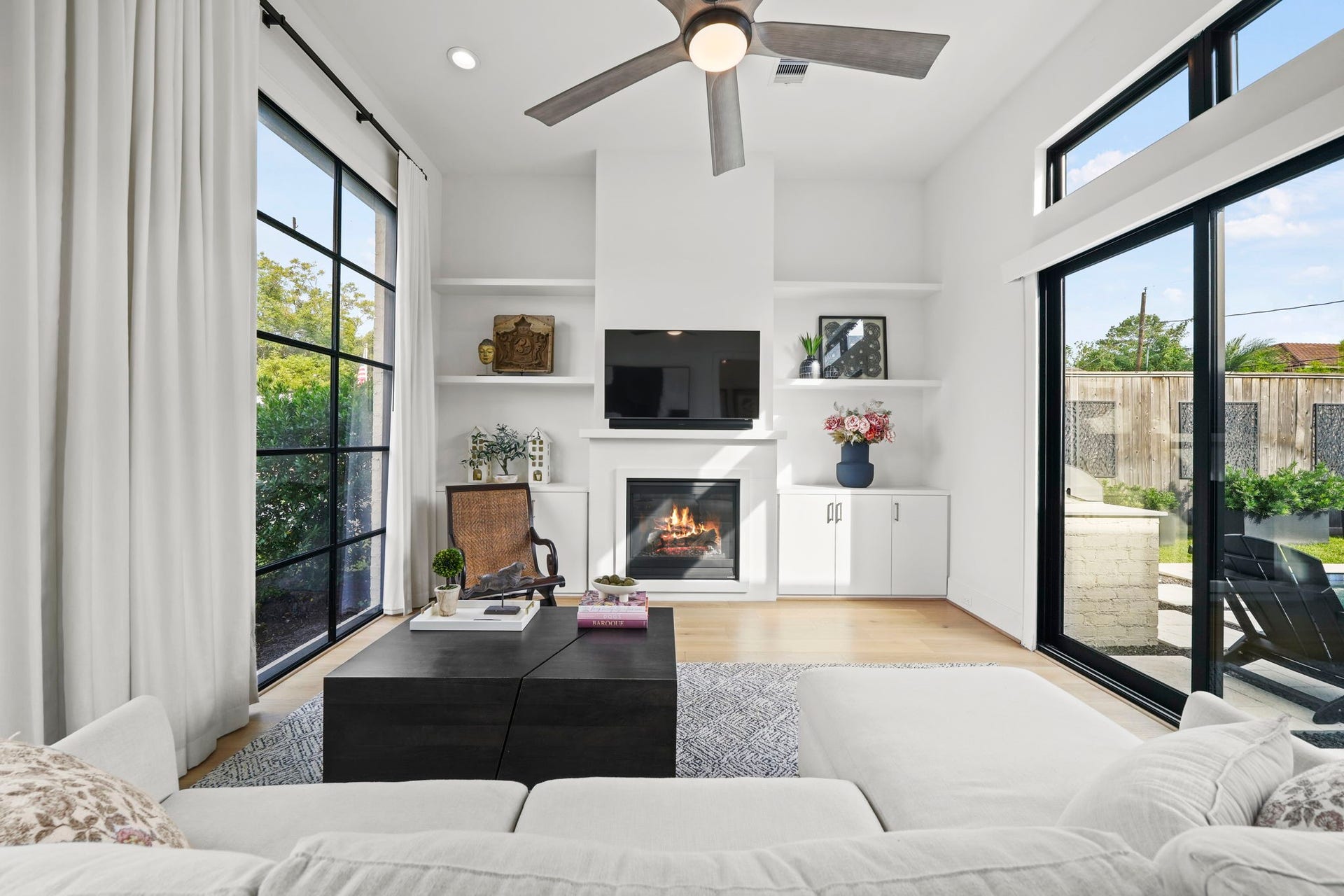 6425 Remlap Street, Houston, TX 77055 The second living space or office with a wall of windows and sliding doors out to the outdoor space!