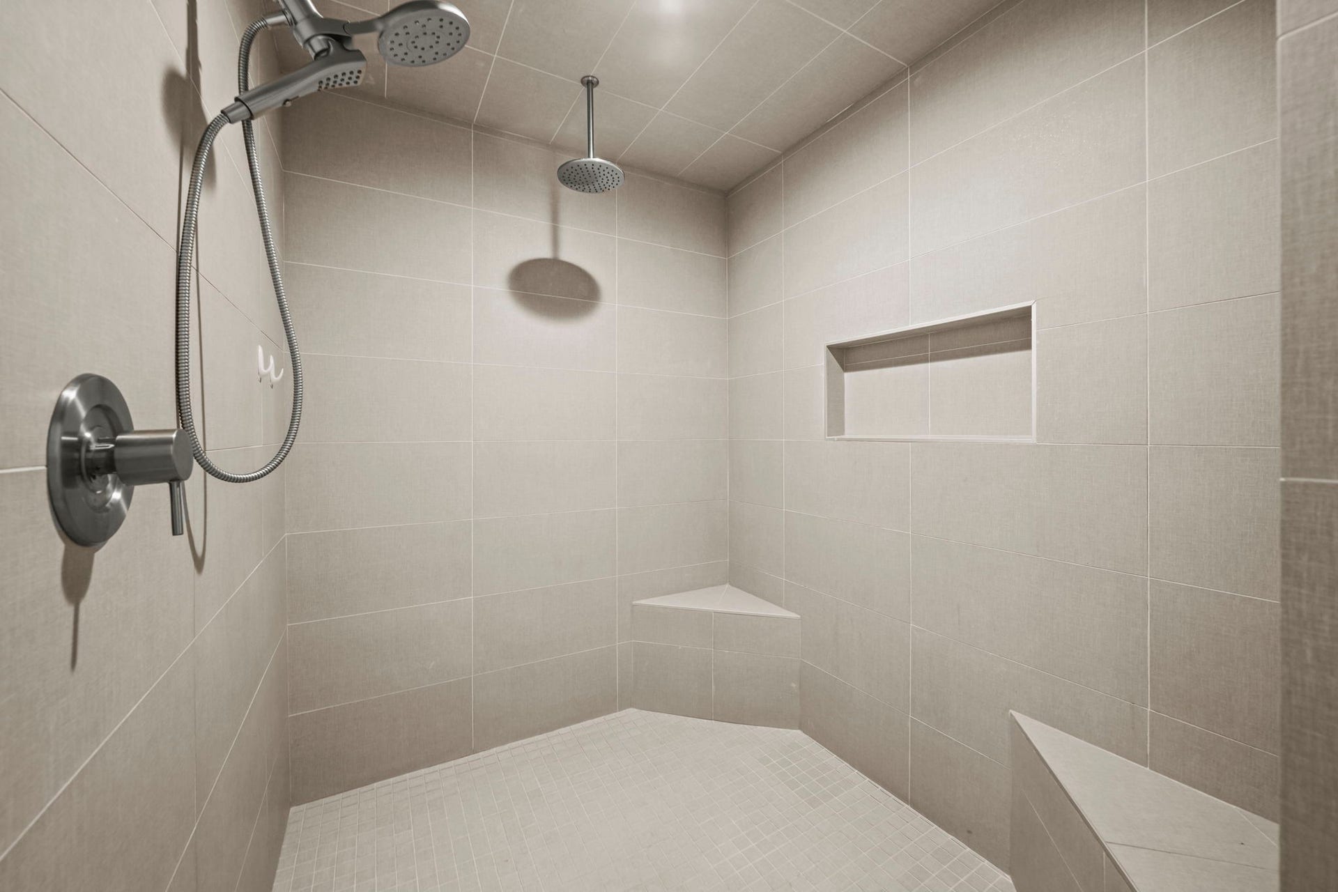 6425 Remlap Street, Houston, TX 77055 The very large shower in the primary bath with rain shower head, seating and an alcove!