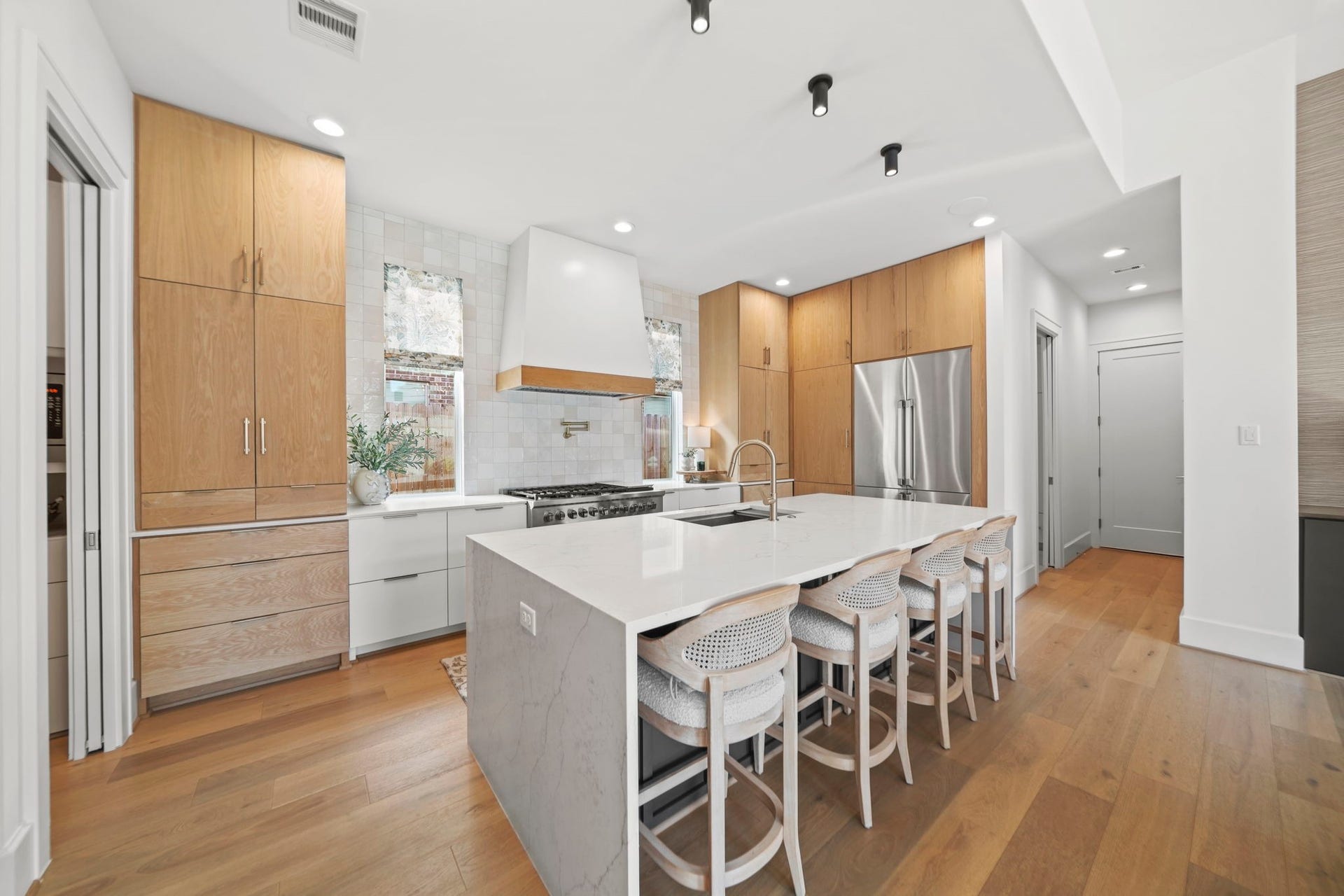 6425 Remlap Street, Houston, TX 77055 A waterfall island with seating and so much storage!