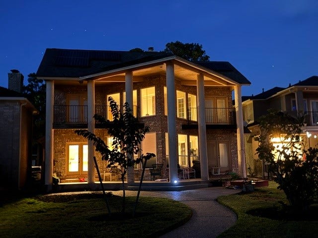 3326 Desert Inn Drive, Montgomery, TX 77356 Wall of windows facing the lake