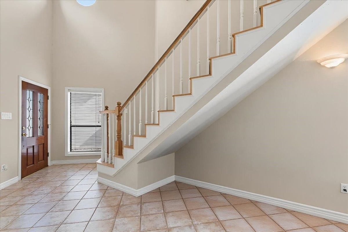 3326 Desert Inn Drive, Montgomery, TX 77356 Entry with high ceilings and light flooding the space